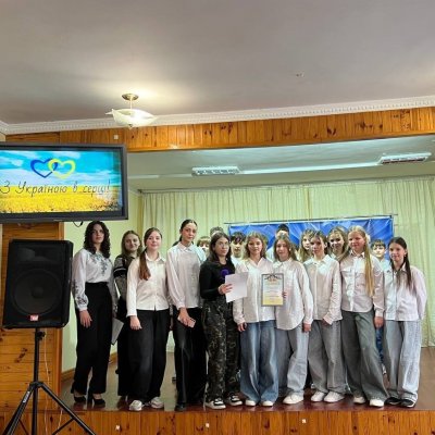 7В